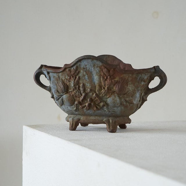 Elegant Jardinière in Patinated and Rusted Cast Iron, Europe, Late 19th Century. This is just a wonderfully patinated...