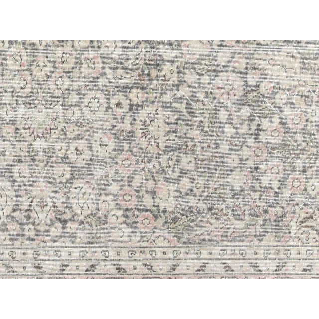 This Vintage Turkish Oushak Rug adds a vibrant touch to any home with its combination of wool and cotton. Measuring 7' x...