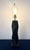 This architectural statement piece functions as a high-relief sculpture, utilizing sharp, multi-faceted planes to create a...