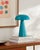 Illuminate your space with the chic and portable Umbra accent table lamp, a beacon of minimalist modern style. Standing at...