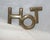 Metal 1960s Mid Century Modern Brass Beveled Edge Footed Hot Word Shaped Trivet For Sale - Image 7 of 8