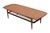 A 1960's Danish coffee table in teak by Paul Jensen for Selig. The rounded rectangular top has an upturned lip on each...