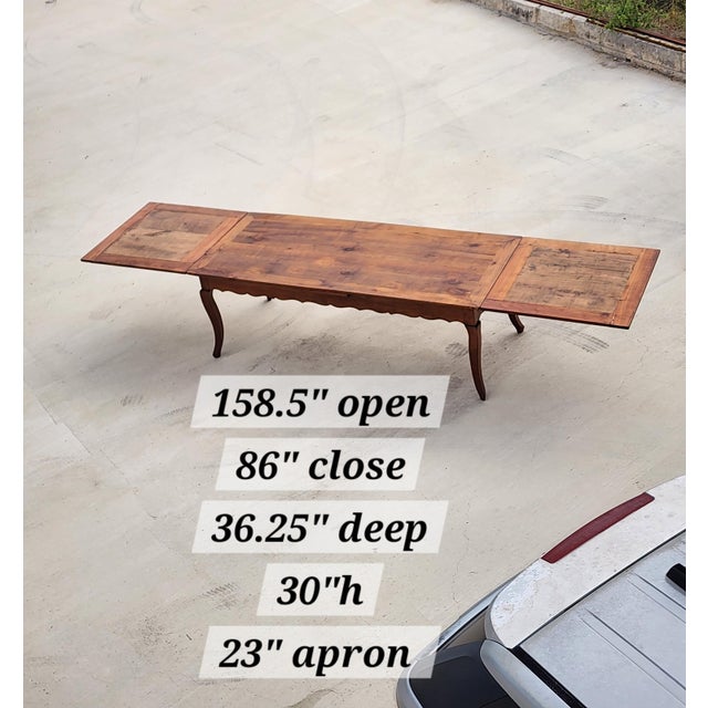 Beautiful French Country style dining table with draw-leaf ends. Each side pulls out to make the table a total of 158.5".
