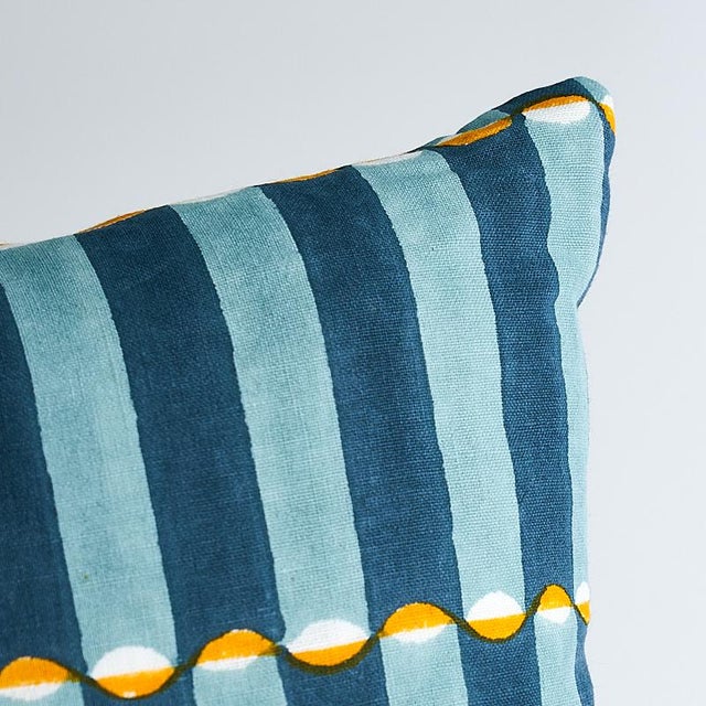 This pillow features Pattee on the front with Luna on the back by Molly Mahon for Schumacher with a knife edge finish....
