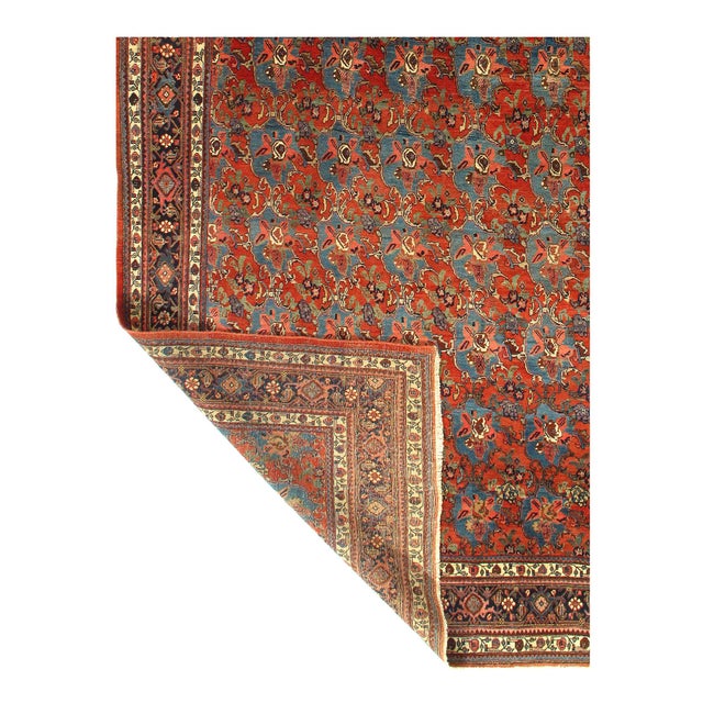 This is a fine antique Persian Bidjar that was made around 1890. The piece was handmade and hand-knotted from vegetable...