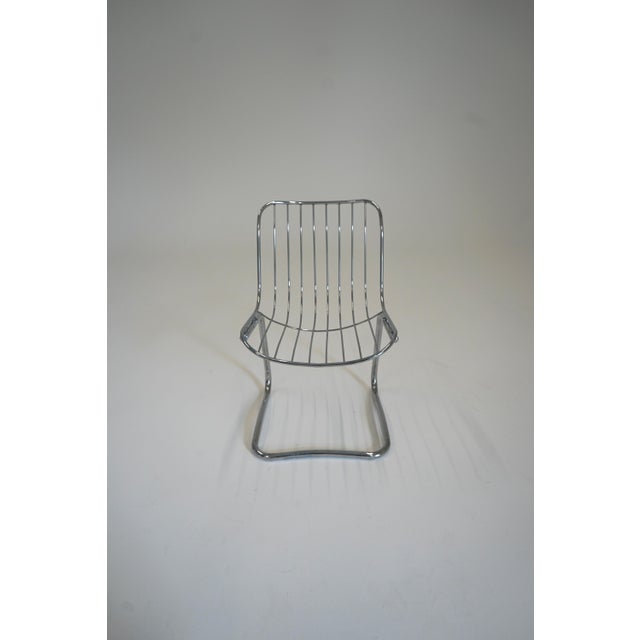 Mid-Century Modern Tubular Chrome Cantilever Dining Chair by Gastone Rinaldi for Rima, 1970s, in Flawless conditions....