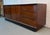 Exceptional Mid-Century Modern credenza by Dyrlund of Denmark, a name synonymous with superior Danish craftsmanship and...