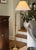 Vintage Stiffel floor lamp crafted in solid brass with a substantial weighted base, turned architectural detailing, and an...