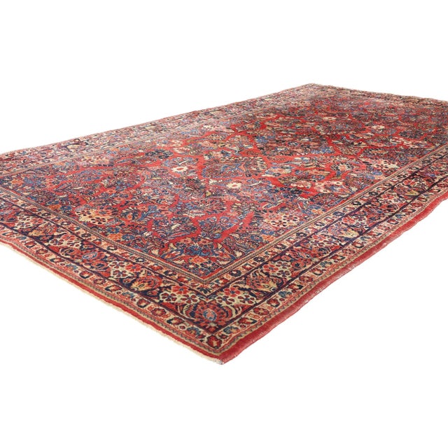 79019 Antique Persian Sarouk Rug, 06'02 x 11'07. This hand-knotted wool antique Persian Sarouk rug is a breathtaking...