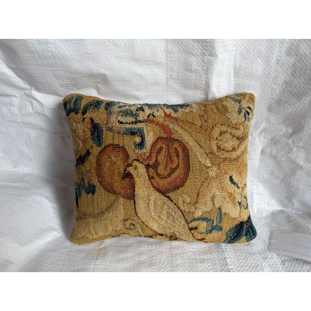 This museum-quality pillow preserves a genuine fragment of an original 17th Century Brussels tapestry, renowned for the...