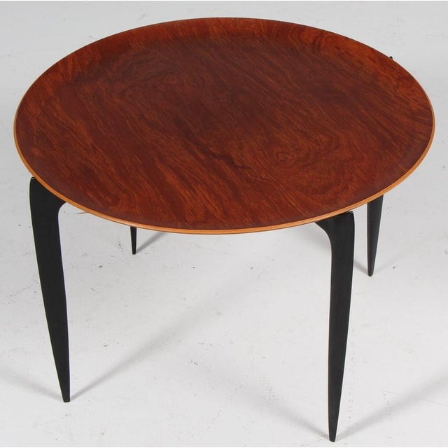 H. Engholm & Svend Åge Willumsen tray table with a plate of teak. Base in original black painted wood. Can be folded...