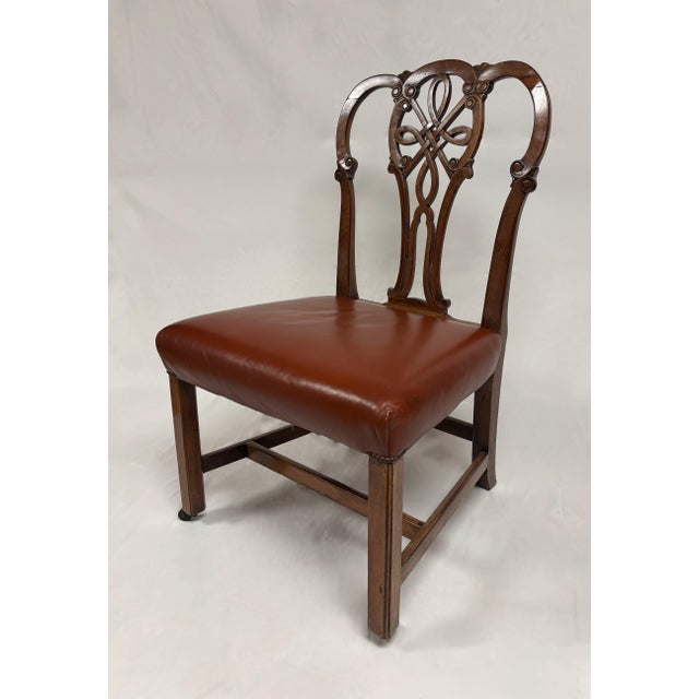 Late 18th Century English Mahogany George III Side Chair Rolled top rail, pierced and carved vertical splat on square...
