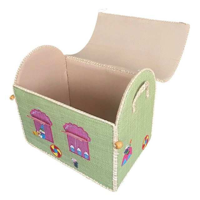 Add a touch of playful enchantment to any playroom or bedroom with this charming, handcrafted toy storage trunk. Expertly...
