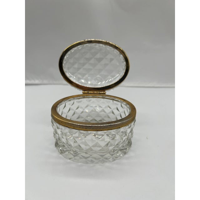 A wonderful early to mid 20th century crystal faceted box or jewelry casket in the style of Baccarat. The piece has a...