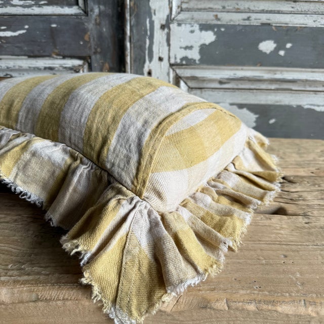 Made in France A timeless linen accent pillow with ruffle and tattered edges woven in France — The latest collection is a...