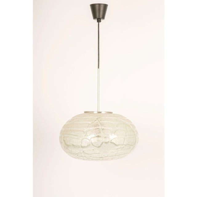 Doria ceiling light with large volcanic murano glass ball. High quality materials, gives a wonderful light effect when it...