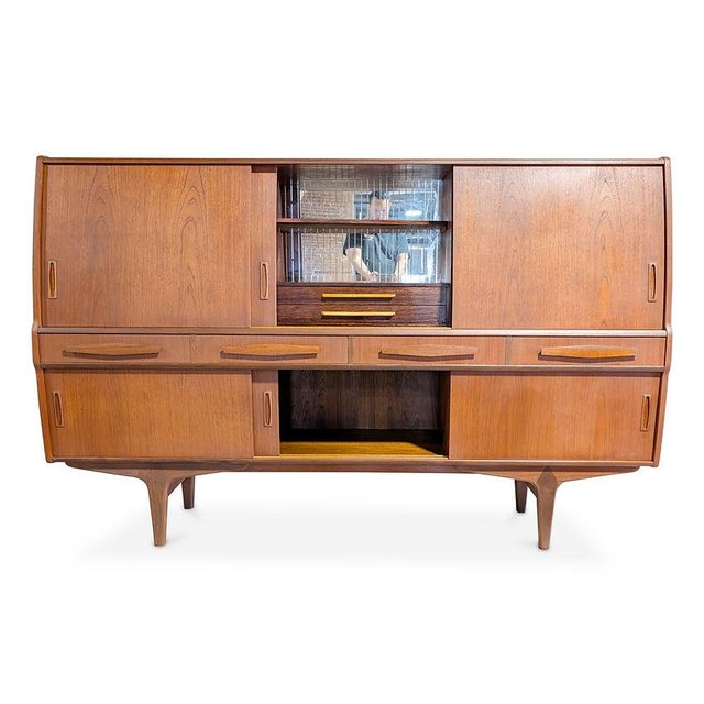 Recently refurbished in our Red Hook workshop Dimensions 50.5" H 78.75" L and 17" D Danish mid-century modern teak...