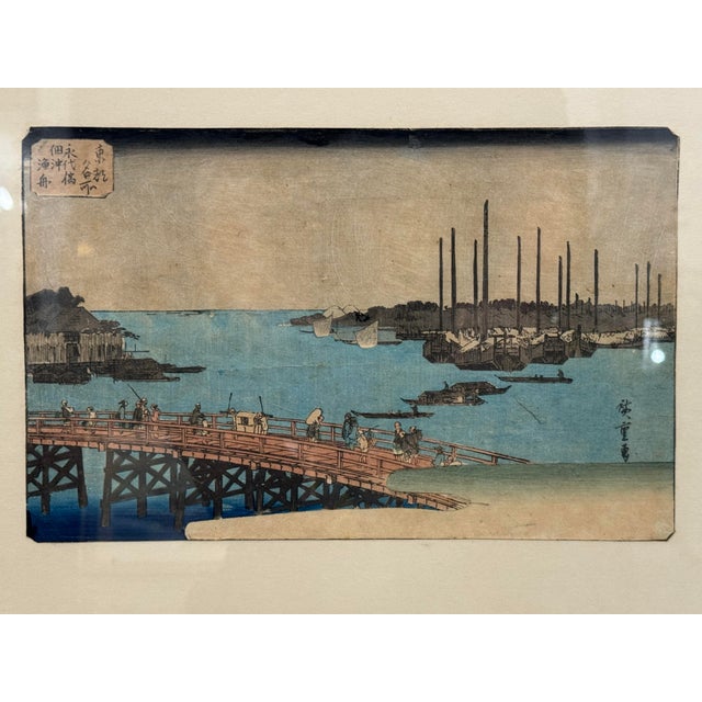 Original Japanese ukiyo-e woodblock print by Utagawa Hiroshige, depicting Eitai Bridge (Eitai-bashi) spanning the Sumida...