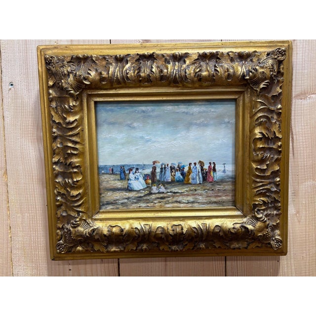 A delightful oil on panel signed F. Hubert, capturing a lively beach scene in the style of the coastal master Eugène...