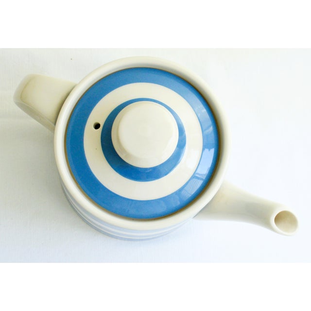 Handmade in England striped Cornishware Tea Pot. Characterized by it's bold horizontal bands and matching domed lid....