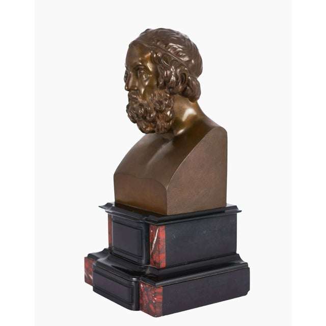 Anonymous, portrait bust of Homer, circa 1900. Brown patinated bronze mounted on a stepped marble pedestal, 34 cm (overall...