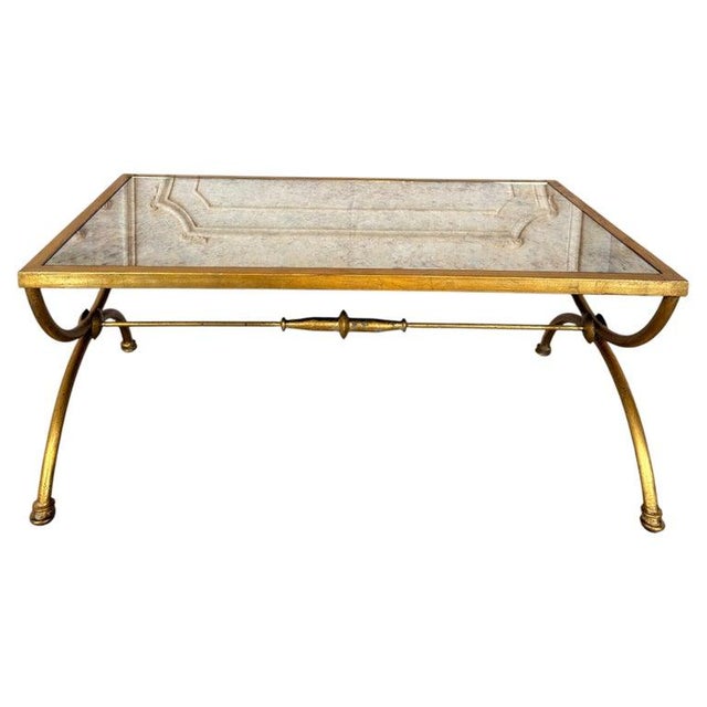 An exquisite new Curule coffee table by Miamar Home, masterfully blending ancient Roman grandeur with Hollywood Regency...