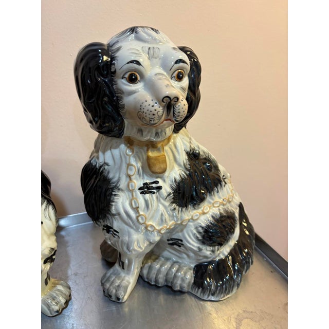Large black/white Staffordshire ceramic dogs pair. Excellent condition.