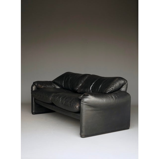 Iconic very comfortable two seater sofa designed by Vico Magistretti for Cassina. This early production sofa retains its...