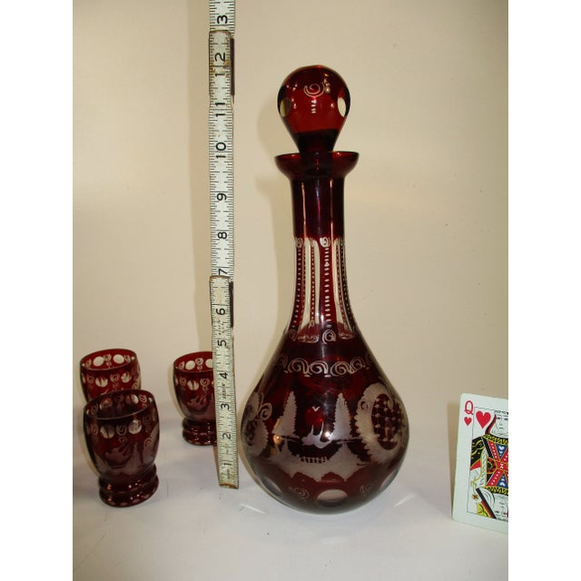 Early 20th Century Bohemian Decanter 6 Liquor Tumblers Red Glass Hand Wheel Engraved Czech For Sale - Image 9 of 11