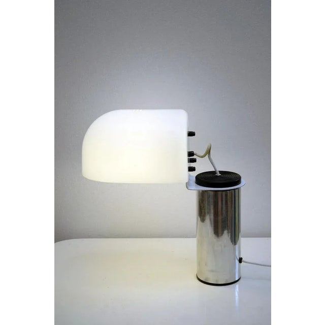 Table lamp design Ezio Didone for Valenti 1970s. Cast iron base with polished steel cylinder, acrylic glass diffuser,...