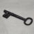 ABOUT A vintage brass and wrought iron skeleton key. Embossed "PENN" on the side. Shown with lifesize hand model for...