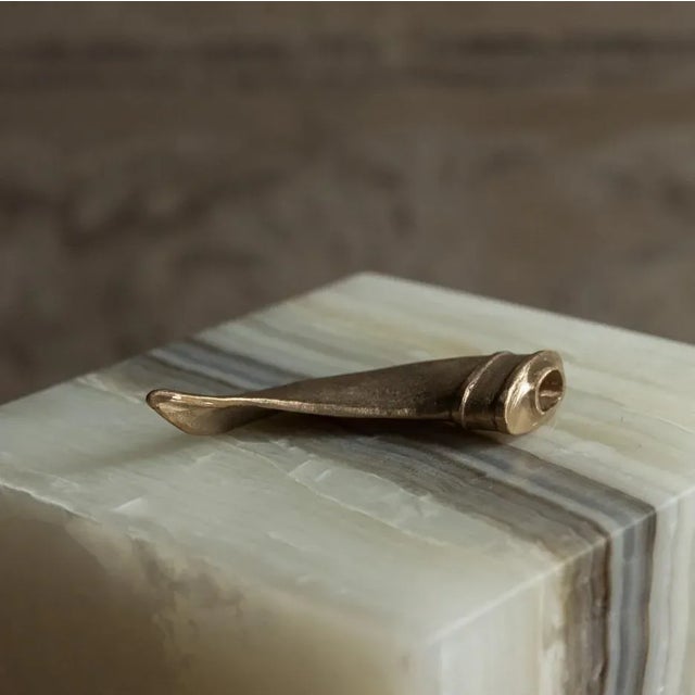 Golden edition - unique bronze lighter by rick owens dimensions: l 11.5 x w 5.5 x h 3 cm materials: bronze the gold...