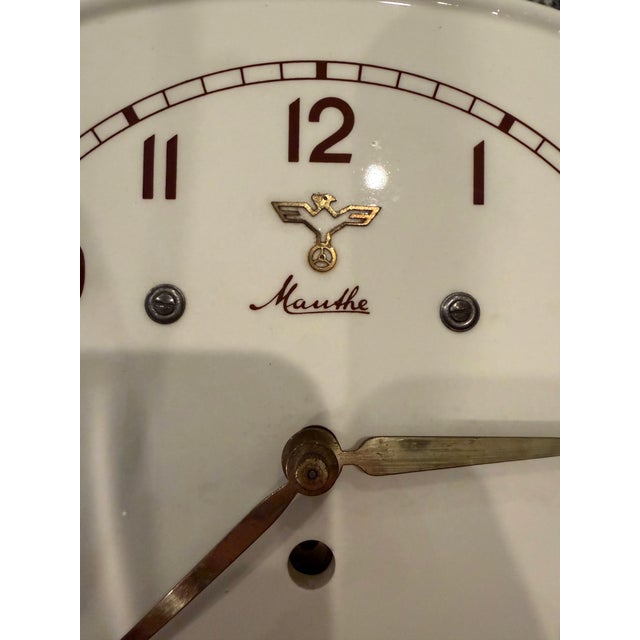 A beautifully preserved German Art Deco wall clock by Mauthe, dating to the late 1930s and showcasing the clean,...