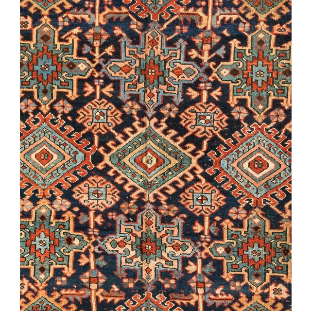 Antique Karaja (Black mountain) rugs are woven in Iran near the Caucasian border and therefore exhibit Caucasian styles...