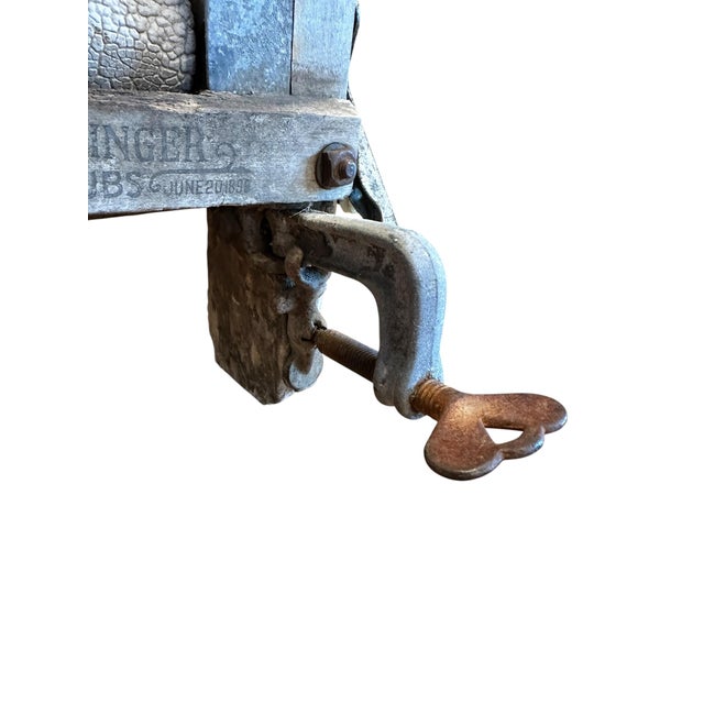 This late 19th-century (patented June 21, 1898) original Anchor brand wringer by Lovell Manufacturing Co. features a...