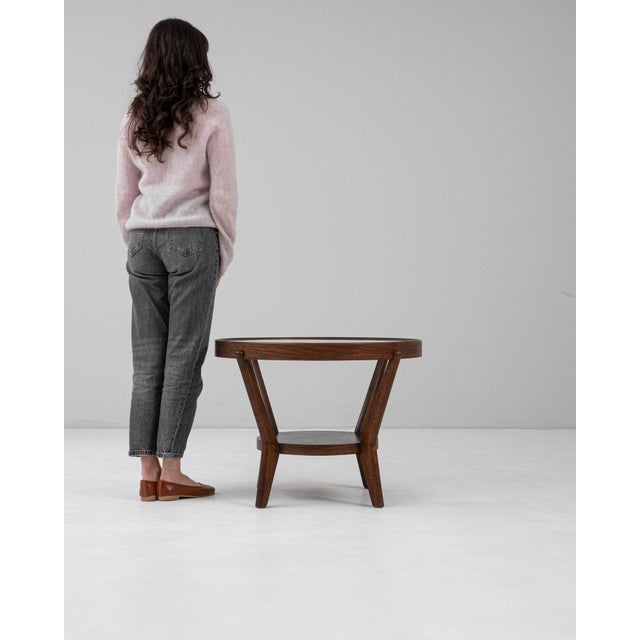 This piece presents as a table, distinguished by dark walnut, sculptural tripod leg. Originating in Czech Republic during...