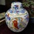 This vintage Asian hand-painted porcelain ginger jar features a beautiful bird motif, showcasing the traditional Chinese...