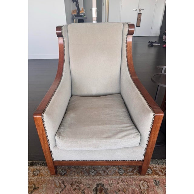 The London Club Chair from luxury maker Dessin Fournir. Beautiful walnut frame finished with French polish, highlighting...