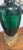 Striking vintage table lamp featuring a beautifully textured green crackle-glass body paired with a warm brass-tone base...