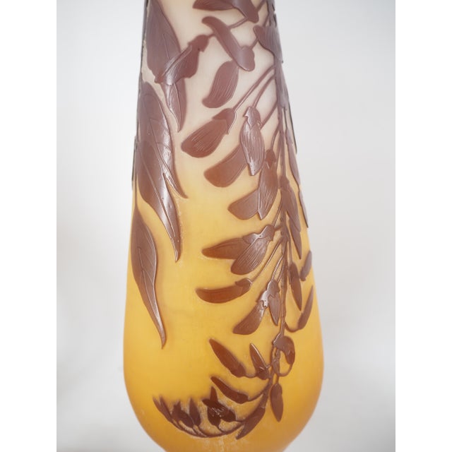 Emile Galle Glass paste vase decorated with wisteria Multi-layered glass acid-etched in cameo and reworked in roulette...