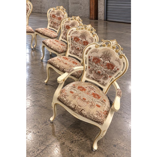 Authentic set of 8 vintage Rococo dining chairs. A stunning blend of French and Italian neoclassical design, these chairs...