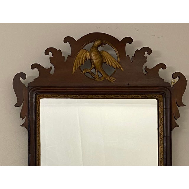 Antique 18th Century Early American Federal Mahogany Wall Mirror with Carved Eagle Pediment, Circa 1790–1815 A fine...