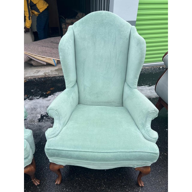 This elegant set of two vintage wingback chairs by Pinnacle in the 1980s features classic traditional Queen Anne style...