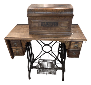 Antique Davis Treadle Sewing Machine in Wooden Cabinet With Ornate Cast Iron Base, Late 19th Century