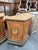 This is a pair of 18th century Italian painted corner cabinets from Tuscany, showcasing the rustic charm and heraldic...