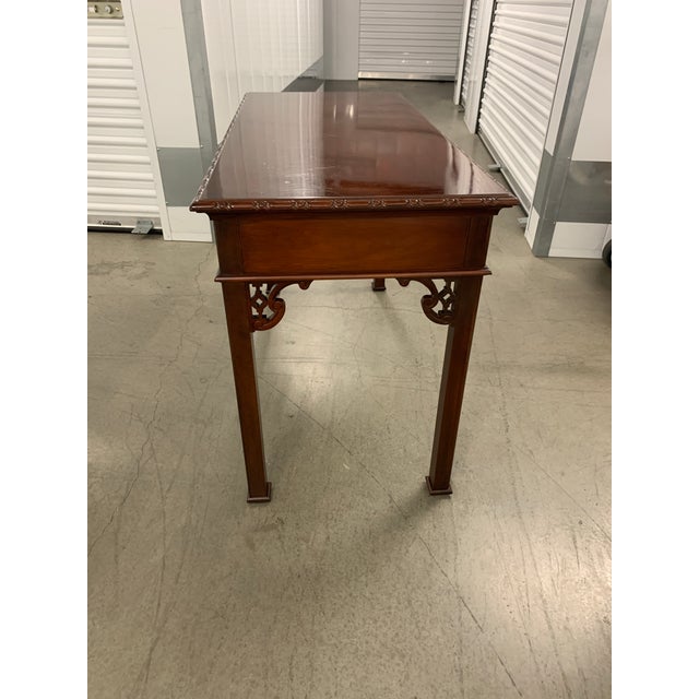Here we have a beautiful classic vintage Baker mahogany Chippendale style writing desk or console table from their...