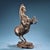 This is a beautiful and dynamic vintage Chinese bronze sculpture of a Rearing Horse. The steed is captured in a lively,...