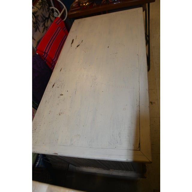 This is a great looking storage piece by Karpen Furniture Chicago. Solid wood, not too heavy, with a chippy cream paint....