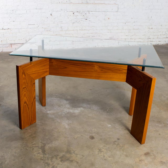 Stunning vintage Scandinavian Modern dining table, desk, deep console or sofa table composed of a double Y or V shaped...