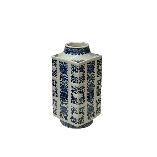 Elevate your collection with this striking Chinese blue and white porcelain square vase, a timeless masterpiece featuring...